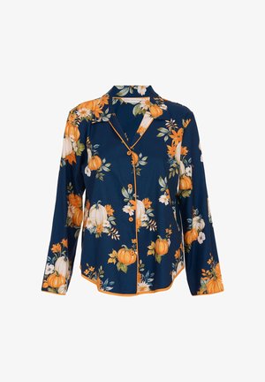 Camicia blu navy a fantasia floreale con zucche arancioni, fiori bianchi e piping arancione a contrasto. Maniche lunghe e design con chiusura a bottoni davanti.