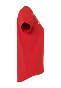 Red short-sleeve t-shirt made of cotton, featuring a round neckline and a straight cut. The fabric appears smooth without patterns or embellishments.
