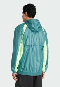 adidas Performance Windbreakers - preloved teal   lime burst