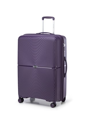 Purple hard-shell suitcase with circular textured design, telescoping handle, and four wheels for mobility. Features a logo on the front.