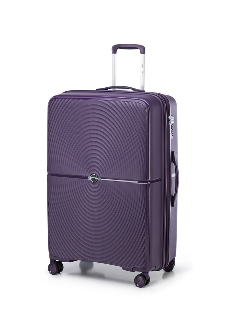 Valigia rigida viola con design a trama circolare, manico telescopico e quattro ruote per una facile mobilità. Presenta un logo sulla parte anteriore.