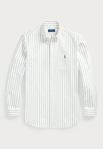 White button-up shirt with blue vertical stripes, long sleeves, and a pocket featuring a small logo. Made from soft cotton fabric.
