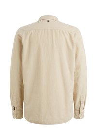 Beige Kordhemd mit Button-Down-Kragen, langen Ärmeln und einem zentralen Logo-Detail auf der Rückseite. Verfügt über eine vertikale Rippstruktur.