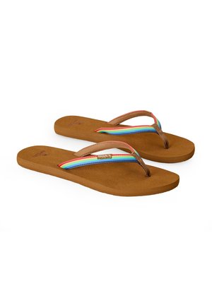 Chanclas planas marrones con correas de tela a rayas de colores del arcoíris y una pequeña etiqueta con el logo "Rip Curl" en las correas laterales.