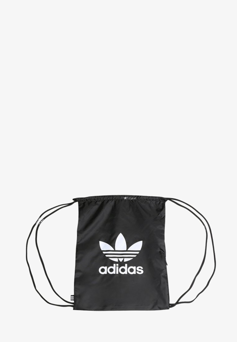 Black drawstring bag made of nylon, featuring a white Adidas trefoil logo. Smooth texture with adjustable cord straps.