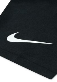 Tessuto di cotone nero con un prominente logo swoosh bianco di Nike. Tessitura liscia con bordi e cuciture pulite.