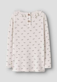 Cremefarvet langærmet skjorte i ribbet stof med små lyserøde og grønne blomsterprint, rynket halsudskæring og detaljer med træknapper bagpå.