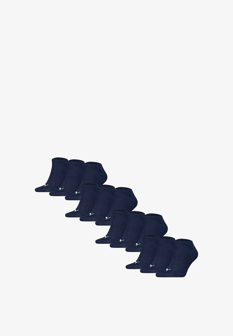 Conjunto de calcetines tobilleros en color navy, con una textura suave y un puño acanalado. Cada calcetín tiene un pequeño logotipo blanco destacado en el lateral.