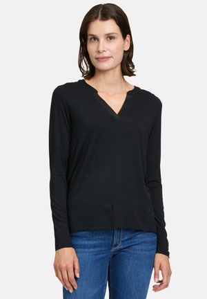 T-shirt à manches longues - schwarz