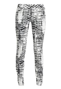 Pantalons slim avec un motif tie-dye noir et blanc en forme de zèbre, fermeture par bouton et zip, et design à cinq poches.