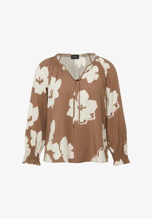 Brown long-sleeve blouse with large white floral prints, gathered neckline with tie, and elastic ruffle cuffs.