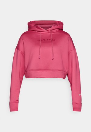Lühendatud roosa kapuutsiga sviiter, mis on valmistatud pehmest kangast ja millel on stringiga kapuuts. Ees on tikitud "NIKE PRO" logo ja varrukal on Nike swoosh.
