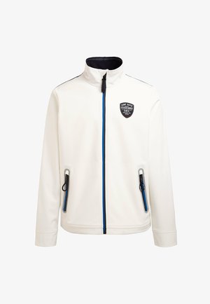 Witte zip-up jas met hoge kraag, blauwe accentritsen en twee zijzakken. Bevat een zwart logo-opdruk op de borst. Soepele stof.