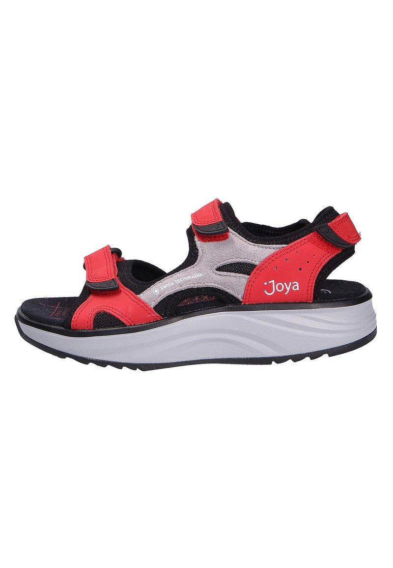 Red and black sport sandals with adjustable straps, cushioned footbed, and a white, ridged rubber sole; includes textured accents.