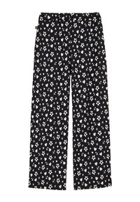 Black fabric trousers with a white floral and heart pattern. Wide-legged design with an elastic waistband and no visible hardware.