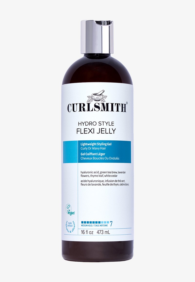 Curlsmith Hydro Style Flexi Jelly in een heldere, amberkleurige fles. Het etiket bevat zwarte en blauwe tekst, witte accenten en een zilveren dop. 473 mL.