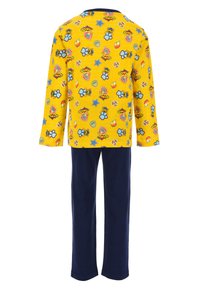 El pijama amarillo de mangas largas presenta un estampado de coloridos personajes de dibujos animados y formas. Los pantalones azul marino completan el conjunto.