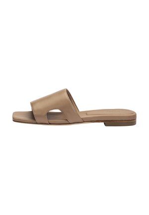 Beige leather slide sandal with open sides, square toe, flat sole, and low heel.