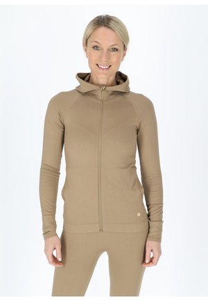 Beige zip-up hoodie with a fitted design, long sleeves, and a hood. Made of ribbed material, featuring a logo detail on the hem.