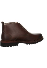 Bottines en cuir marron avec une finition lisse, bout rond, laçage à deux œillets et semelle en caoutchouc robuste. Talon renforcé avec une étiquette en boucle.