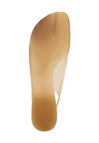 Clear plastic heeled sandal sole, beige color, smooth surface with textured grip pattern, slightly contoured shape, and open back design.