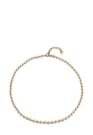 Collar de cuentas doradas con cuentas redondas uniformes, que cuenta con un extensor de cadena para longitud ajustable y un pequeño acento de etiqueta.