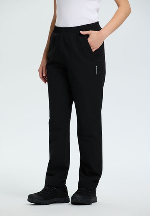 Zwarte stretchbroek met een elastische tailleband, zijzakken en een ritszak, gemaakt van een gladde, duurzame stof.