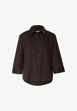 Camicia in velluto a coste di colore marrone scuro, con colletto, chiusura frontale con bottoni e maniche a tre quarti. Presenta un orlo curvo e una sottile texture a costine.