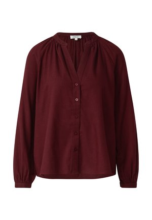 Bordeauxrode blouse met lange mouwen, een knoopsluiting aan de voorkant, geplooide details bij de schouders en een afgeronde zoom. Zachte stof met geribbelde manchetten.