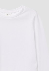 Witte langemouwen T-shirt van katoen. Heeft een ronde halslijn en een gladde textuur met minimale naden. Merkenlabel zichtbaar bij de kraag.