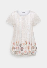 Haut crème léger et semi-transparent à manches courtes, avec détails boutonnés et motif floral coloré à l'ourlet.