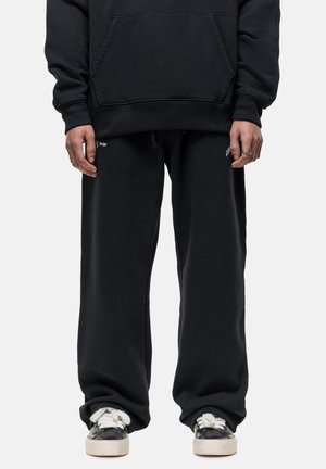 ANT - Tracksuit bottoms - black