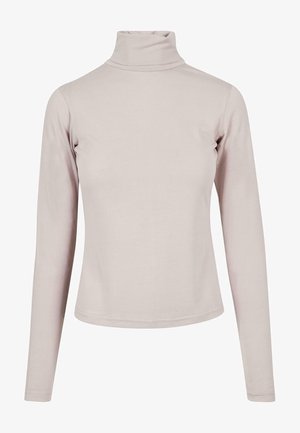 Vaaleanpunainen pitkähihainen poolopaita, joka on valmistettu joustavasta kankaasta ja se istuu tiukasti. Ominaisuuksiin kuuluu korkea kaulus ja sileä pinta.