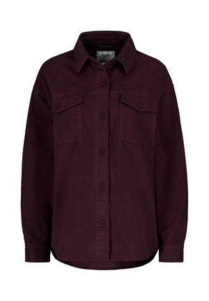 Bordeauxrotes Cordhemd-Jacke mit Kragen, zwei aufgesetzten Fronttaschen, Knopfverschluss und einem leicht geschwungenen Saum. Strukturierter Stoff.