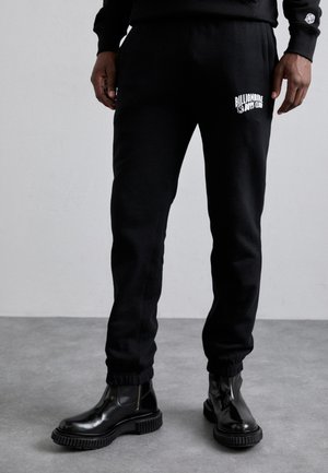 SMALL ARCH LOGO  - Tracksuit bottoms - black