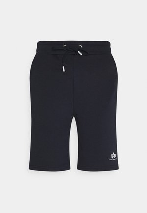 Mornarsko modri kratke hlače iz mehkega blaga, z elastiko v pasu in vrvico za zategovanje, ter majhnim belim logotipom na levi stegnu.