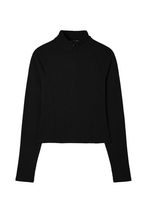 Veste noire à manches longues zippée avec col montant et silhouette ajustée sur fond blanc.