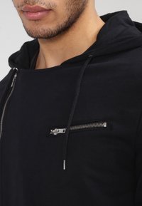 YOURTURN Mikina na zip - black