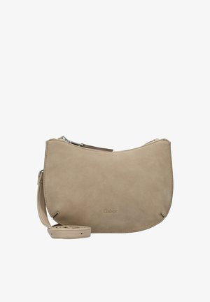 Bolso cruzado de ante beige con un diseño curvado, cierre de cremallera y correa ajustable. Presenta un sutil logo grabado en la parte delantera.