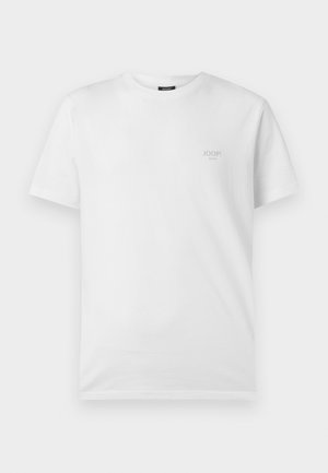 Λευκό βαμβακερό T-shirt με κοντά μανίκια, στρογγυλή λαιμόκοψη και ένα μικρό, διακριτικό γκρι λογότυπο στο αριστερό στήθος.