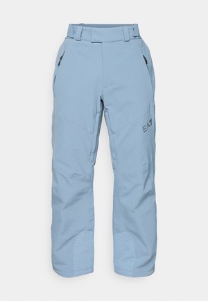 Helle blaue Skihosen aus einem strapazierfähigen Material, mit zwei Reißverschlusstaschen und texturierten Patches an den Unterschenkeln. EA7-Logo an der Seite.