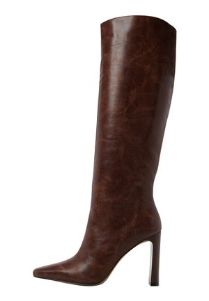 Tall brown leather high-heeled boot with pointed toe and slim block heel, reaching just below the knee.