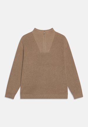 Beige uldtrøje med høj krave, V-formet udskæring og lynlås bagpå. Har ribbet struktur og lange ærmer.