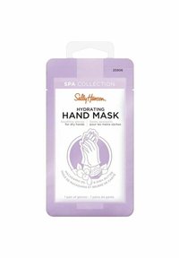 Pakkauksen Sally Hansen -kosteuttavalle käsinaamiolle on laventelinvärinen tausta, valkoista ja purppuraa tekstiä sekä kuva käsistä, joita ympäröivät makadamia-pähkinät.