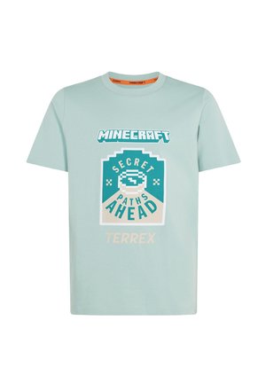 Lyseblå t-shirt med "Minecraft"-logo og pixelart-grafik med teksten "Secret Paths Ahead" og "Terrex" foran.