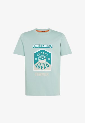 Jasnoniebieska koszulka z logo "Minecraft" oraz pikselową grafiką z napisem "Secret Paths Ahead" i "Terrex" z przodu.