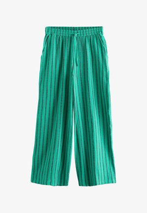 Zöld, bő szárú nadrág, függőleges fekete csíkokkal, rugalmas derékrésszel, zsinórral és oldalzsebekkel.