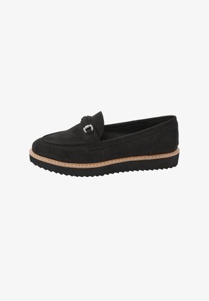 Black suede slip-on loafer with silver buckle detail, tan stitched midsole, and black ridged rubber outsole, side view.