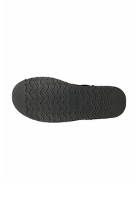 Zwarte rubberen sneakerzool met een golvende textuur en een ronde neus. Inclusief een rechthoekig logopatch in het midden.