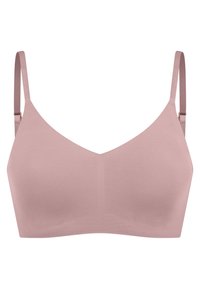 Wireless bra in soft pink material with a smooth texture. Features adjustable straps and a v-shaped neckline design. No patterns or hardware.